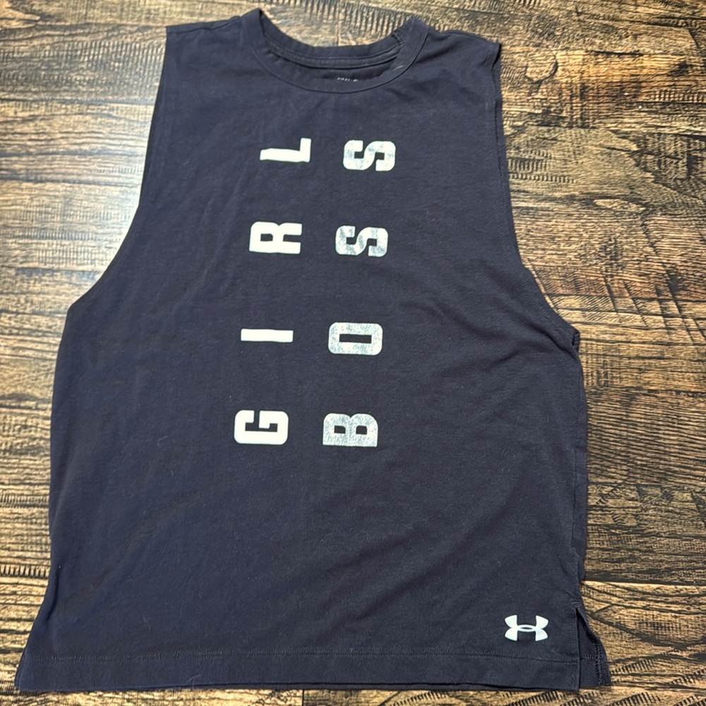 Under Armour sleeveless shirt. Never worn.